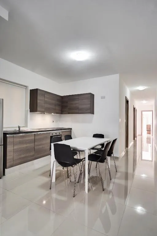 The Village Apartments — photo 2